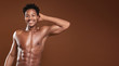 © neonshot - Fit african man with naked torso.