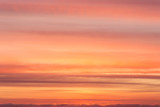Fototapeta Zachód słońca - Dramatic soft sunrise, sunset orange yellow red sky with clouds background texture