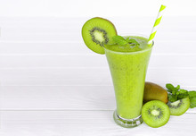 Kiwi Yogurt Fruit Juice Smoothie And Green Kiwi Juice Drink Healthy, Delicious Taste In A Glass For Weight Loss On A White Wooden Background.