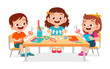 © Colorfuel Studio - happy cute little kids boy and girl make paper craft