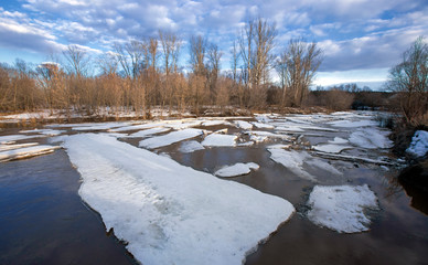 Ice drift on the river. Spring sunny day