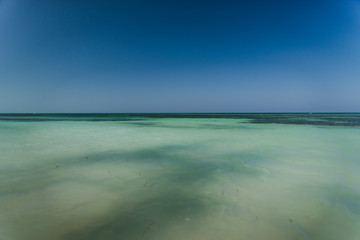 Ocean water on a beach in Cuba. 