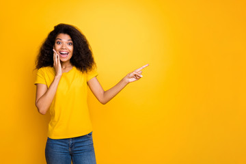 Sticker - Portrait of her she nice attractive lovely glad cheerful cheery wavy-haired girl showing copy space ad new novelty solution isolated over bright vivid shine vibrant yellow color background