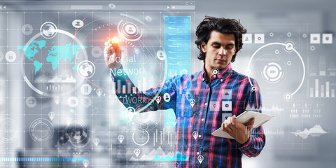 Wall Mural - man using media interface. mixed media