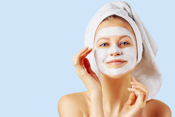 Wall Mural - cosmetology, skin care, face treatment, spa and natural beauty concept. woman with facial mask.