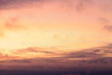 Wall Mural - a beautifully backlit colorful sunset sky with the colors of sunrise and sunset.