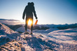 © Giorgio Pulcini - Man hiking in the mountains in winter