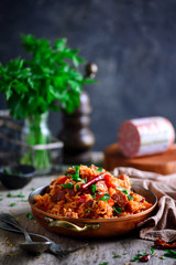 Canvas Print - Dominican rice with vegetables and sausages