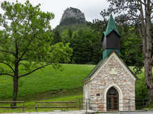 Small Chapel With Stone Walls And A Green Roof