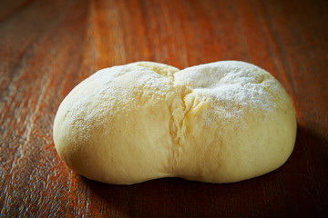 Wall Mural - soft bread on wooden background 