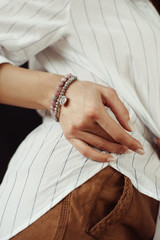 Wall Mural - bracelet on a girl’s hand close-up