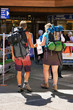 © Roman Babakin - Zermatt, Switzerland - August 24, 2016: Tourists backpackers with the city map at the tourist offcie of Zermatt in Switzerland.