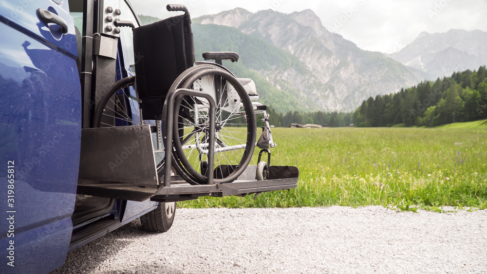 Slide Rider Handicapped Device Photo of black electric lift specialized vehicle for people with ...