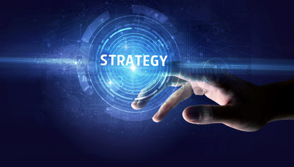 Hand touching STRATEGY button, modern business technology concept