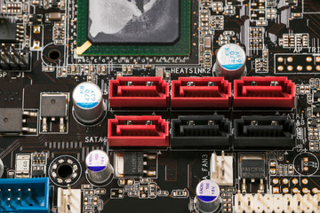 Sticker - SATA connectors on the computer motherboard in a row.