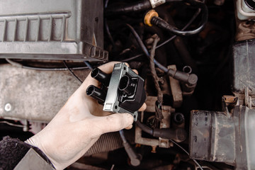 replacing the ignition coil of a car.