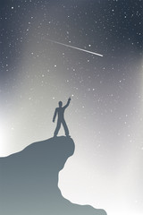 Wall Mural - man in mountain watching shooting stars