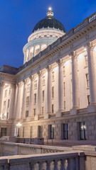 Wall Mural - Photo Vertical frame Utah State Capital Building in Salt Lake City glowing against vibrant blue sky