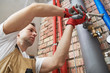 © Kadmy - plumber installing water equipment - meter, filter and pressure reducer