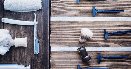 Shaving accessories on a wooden texture background. Tools. Disposable shaving machine, brush, foam and hazard razor.