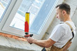 © Kadmy - vinyl windowsill installation. Filling polyurethane foam