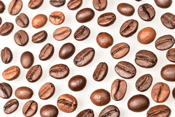 Poster - coffee beans isolated on white background, full frame close up image of coffee beans