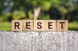 Wooden Block With The Word Reset