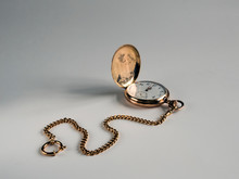 Old Pocket Gold Watch On The Table