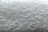 Fototapeta Storczyk - White fluffy snow texture with a gradient from light to dark