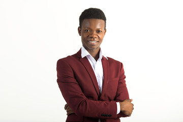 handsome young african man in a suit on a white background