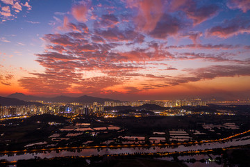 Canvas Print - Aerial View of rural green fields in Hong Kong border at sunset