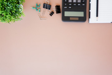 Top view white office desk table with the office equipments, computer keyboard and other office supplies on the modern space, flat lay.