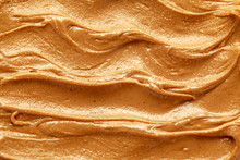 Fresh Smooth Peanut Butter Closeup Background, Texture