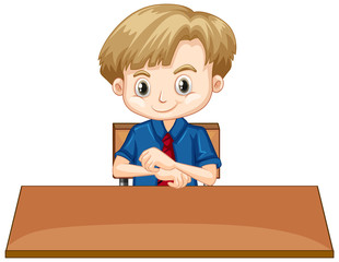 Poster - Boy sitting on the wooden desk on white background