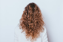 Rear View Woman's Head With Beautiful Long Naturally Curly Hair