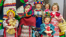 Set Of Handmade Textile Human Rag Dolls, Slavic Ethnic Traditional Toy, Folk Craft Souvenir, Art Embroidery On Canvas, On Sale At Ethno Festival Fair. Slavic Folk Concept.