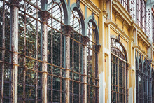 Arches Of An Old Rusty Greenhouse