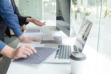 Wall Mural - programmers work on the development of coding and coding technology on white desks and website desig
