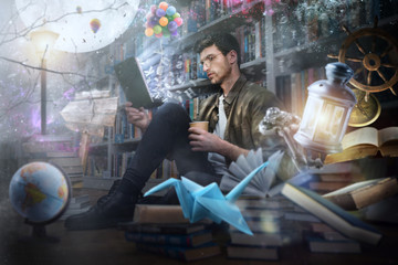 Poster - Boy reads a book at night in a library. Concept of fantasy, imagination and creativity