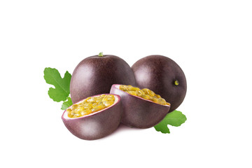 Wall Mural - Isolated passion fruit. Two fruit passionfruit with half and green leaves isolated on white background