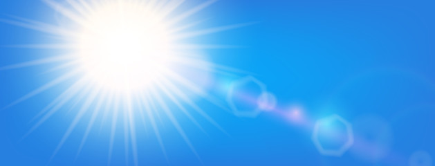 Wall Mural - lins flare, realistic flashes of the sun in the blue sky.