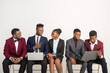 © Alexandr - handsome african people in suits on white background with laptops