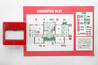 © Pixel-Shot - Evacuation plan and manual call point on white background
