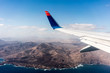 © luchschenF - Canary Islands mountain landscape under airplane wing