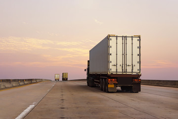 White Truck on highway road with  container, transportation concept.,import,export logistic industrial Transporting Land transport on the asphalt expressway