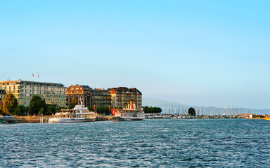 Canvas Print - Ships in Geneva Lake near Quai du Mont-Blanc in summer, at Geneva in Switzerland. Mixed media.