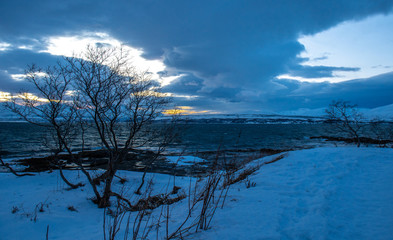 Wall Mural - Sunset over Tromso.Norway.Coast of the Norwegian Sea.