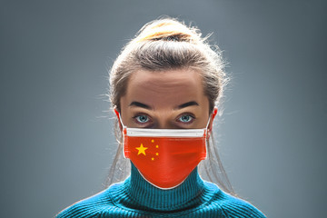 Wall Mural - Woman in protective mask to health protection from coronavirus risk disease, flu outbreak, coronaviruses influenza as dangerous viral strain. 2019 Novel Coronavirus (2019 nCoV) concept. China hold on