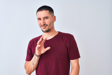 Poster - Young handsome man standing over isolated background disgusted expression, displeased and fearful doing disgust face because aversion reaction. With hands raised. Annoying concept.