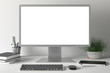 © dimamoroz - Workspace with blank computer monitor white screen mock up on the white desk near white wall. monitor; screen; computer; mock up;